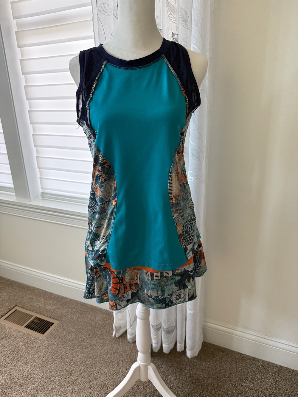 SofiBella Athletic Tank with Teal Center & Navy Accents and matching skort.